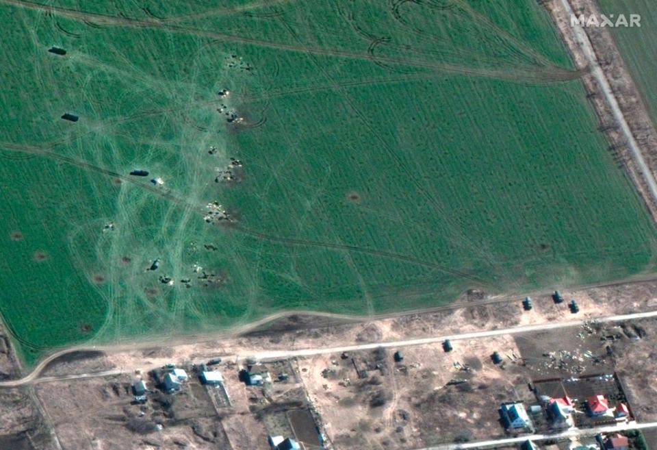 This satellite image provided by Maxar Technologies shows a view of deployed artillery in Talakivka, northeast of Mariupol (AP)