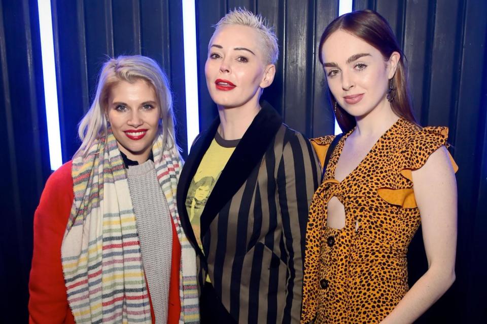 Rose McGowan (centre), joined by Pips Taylor and Louisa Connolly-Burnham yesterday evening (Dave Benett/Getty Images)
