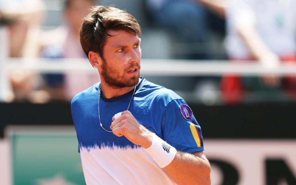 Cameron Norrie of Great Britain reacts in his men's singles first round match against Luca Nardi of Italy during day three of Internazionali BNL D'Italia at Foro Italico on May 10, 2022 in Rome, Italy. - GETTY IMAGES