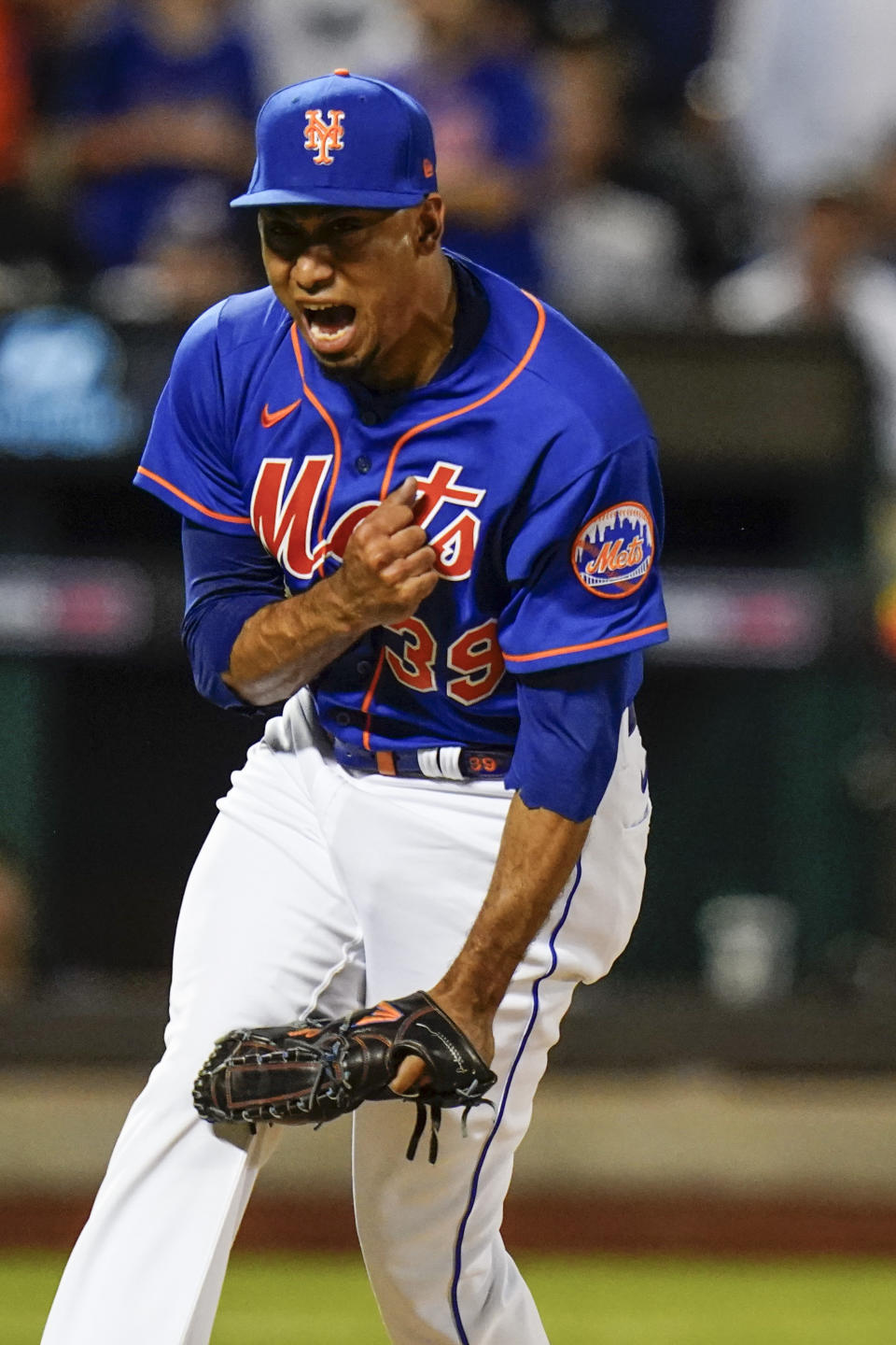 New York Mets relief pitcher Edwin Diaz (39) celebrates after a baseball game against the New York Yankees Tuesday, July 26, 2022, in New York. The Mets won 6-3. (AP Photo/Frank Franklin II)