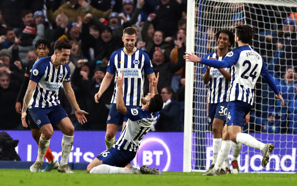 Alireza Jahanbakhsh, centre, was able to celebrate a stunning goal as Brighton drew with Chelsea (Gareth Fuller/PA)