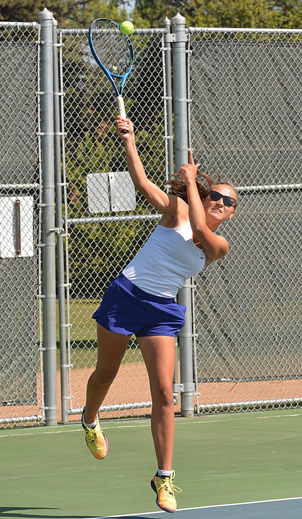 Watertown's Leyla Meester serves the ball during a match against Harrisburg in a high school girls tennis triangular on Tuesday, Sept. 12, 2023 at Highland Park.