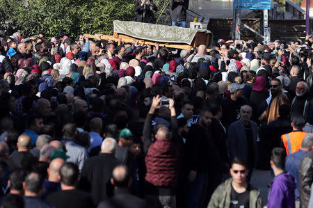 Relatives and friends carry the coffin of Aiia Maasarwe, 21, an Israeli student killed in Melbourne, during her funeral in her home town of Baqa Al-Gharbiyye, northern Israel January 23, 2019. REUTERS/Ammar Awad