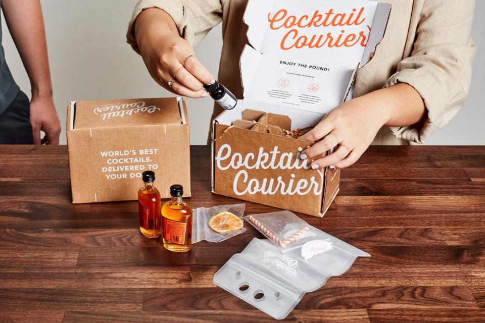 person unboxing a shipment from Cocktail Courier