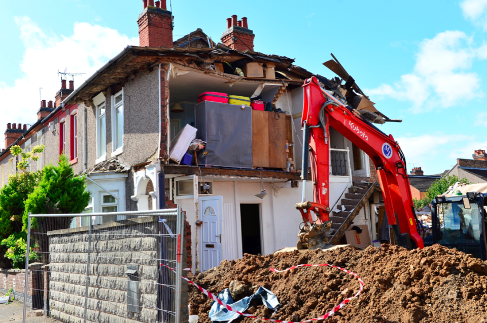 The family saw part of their property collapse because of the building work next door (SWNS)