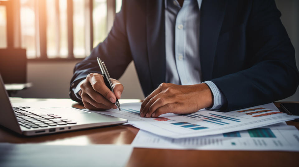 An accountant holding a calculator and paperwork, representing the complex financial regulations the company must manage.