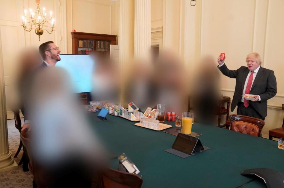Boris Johnson holding a beer in the Cabinet Room celebrating his birthday