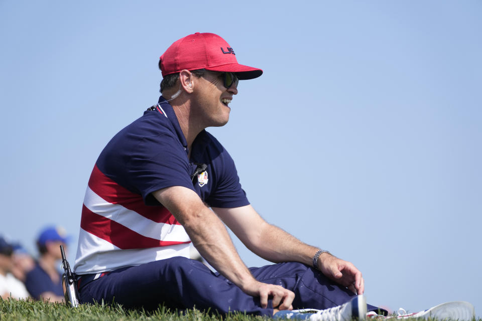 United States' Team Captain Zach Johnson watches play on the 1sr green during the singles matches at the Ryder Cup golf tournament at the Marco Simone Golf Club in Guidonia Montecelio, Italy, Sunday, Oct. 1, 2023. (AP Photo/Andrew Medichini)