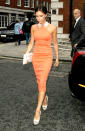 Despite sporting her signature scowl, we adored the self-designed, tangerine-hued frock Victoria Beckham donned for pal Simon Fuller's birthday party in London earlier this week. The mom-of-four's posh accessories included a white clutch (from her collection, naturally), dark nail polish, and Giuseppe Zanotti leather platforms. (7/9/2012)<br><br><a href="http://twitter.com/YahooOmg" rel="nofollow noopener" target="_blank" data-ylk="slk:Follow omg! on Twitter!;elm:context_link;itc:0;sec:content-canvas" class="link ">Follow omg! on Twitter!</a>