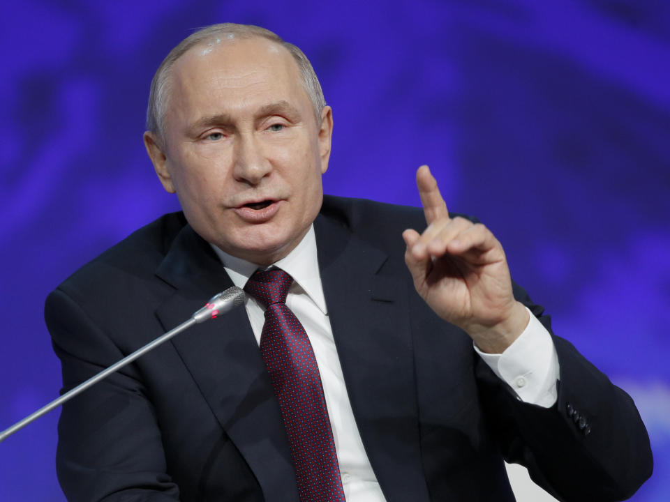 Russian President Vladimir Putin gestures while speaking at a plenary session of the International Arctic Forum in St. Petersburg, Russia, Tuesday, April 9, 2019. (AP Photo/Dmitri Lovetsky)