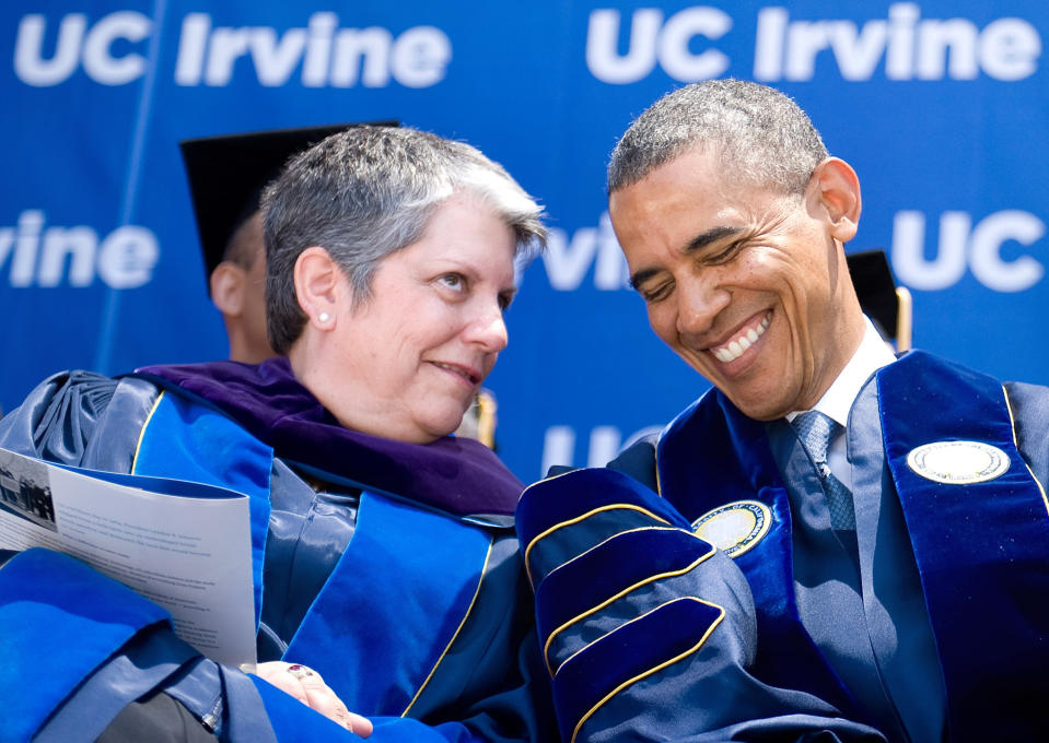 ANAHEIM, CA - JUNE 14: Pres. Barack Obama shares a laugh with UC Pres. Janet Napolitano during UC Irvine's 2014 commencement ceremony at Angel Stadium in Anaheim. Pres. (Photo by Mindy Schauer/Digital First Media/Orange County Register via Getty Images)