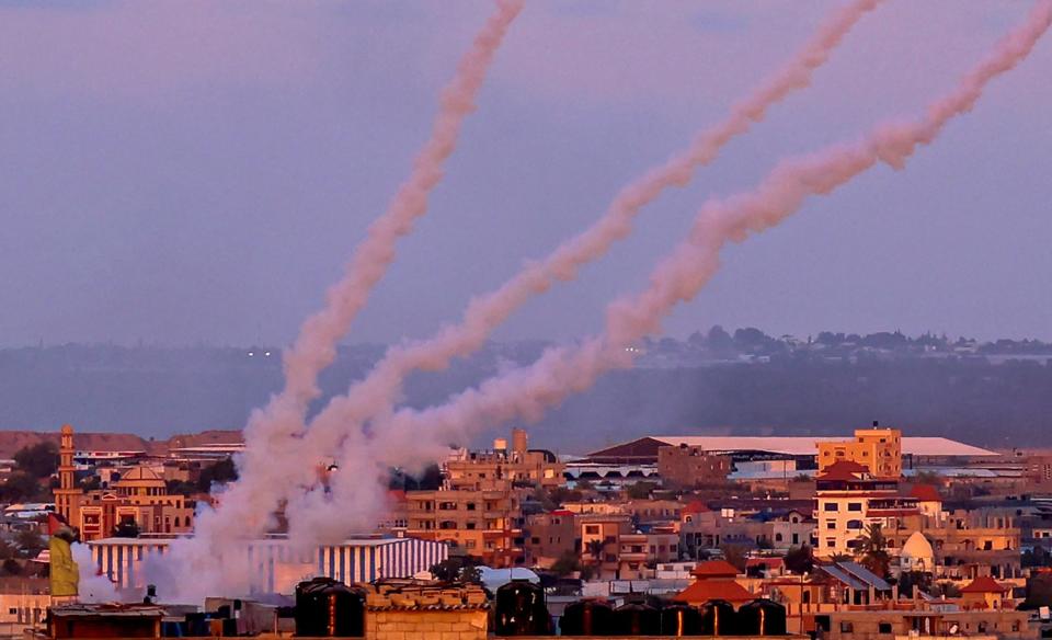 Rockets sail through the air from Gaza.