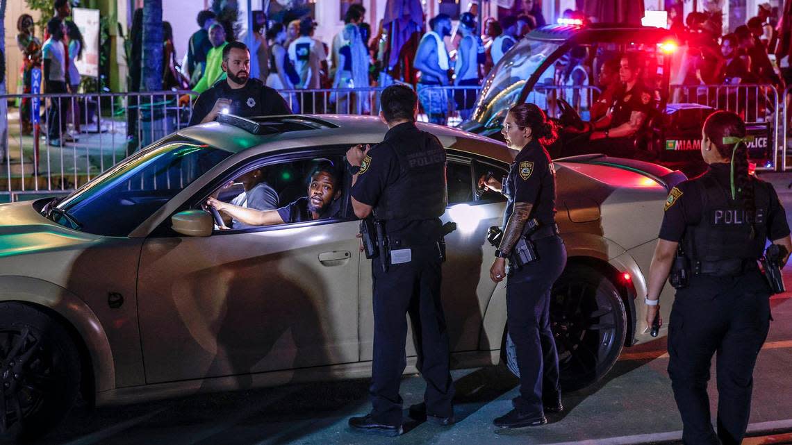 Miami Beach police make a traffic stop on Ocean Drive during spring break on Miami Beach, Florida on Sunday, March 17, 2024.