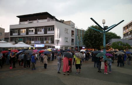 People take part in a protest against migrants in the Bosnian town of Bihac
