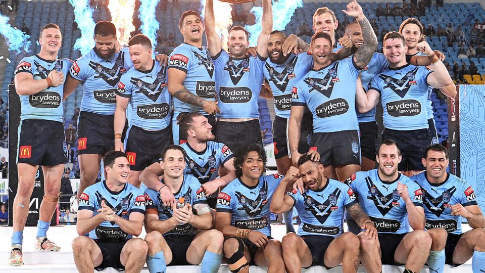 James Tedesco, pictured here holding aloft the Origin shield with his NSW teammates.