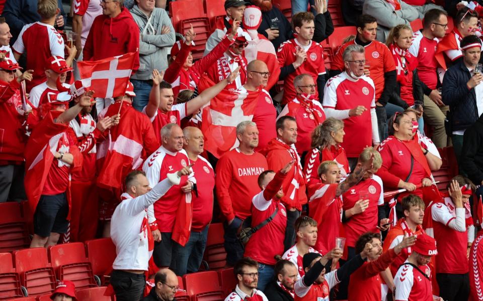 Denmark fans chant in support of Denmark's midfielder Christian Eriksen  - AFP