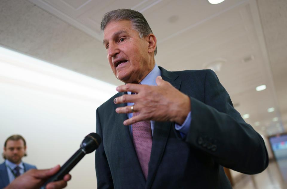 Sen. Joe Manchin, D-W.Va., speaks to reporters outside the hearing room where he chairs the Senate Committee on Energy and Natural Resources, at the Capitol in Washington, July 19, 2022.