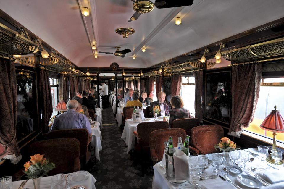 PARIS, FRANCE - OCTOBER 16 : Orient Express Train morning after its departure from Gare Du Nord Station in Paris to Venice in Italy. The art deco dining room with chinese style laque plated wood pannels.October 16, 2008. (Photo by Ariel FUCHS/Gamma-Rapho via Getty Images)