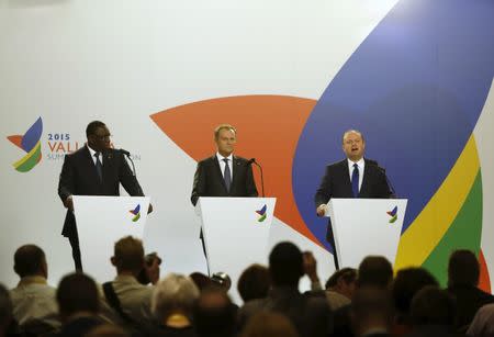 (L to R) President Macky Sall of Senegal, European Council President Donald Tusk and Maltese Prime Minister Joseph Muscat address a press conference at the end of the Valletta Summit on Migration in Valletta, Malta, November 12, 2015. REUTERS/Darrin Zammit Lupi