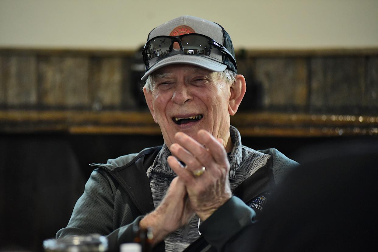 Gary Weaver celebrates at Snow Trails in Mansfield this spring after completing his 60th season as a local ski patrol member.