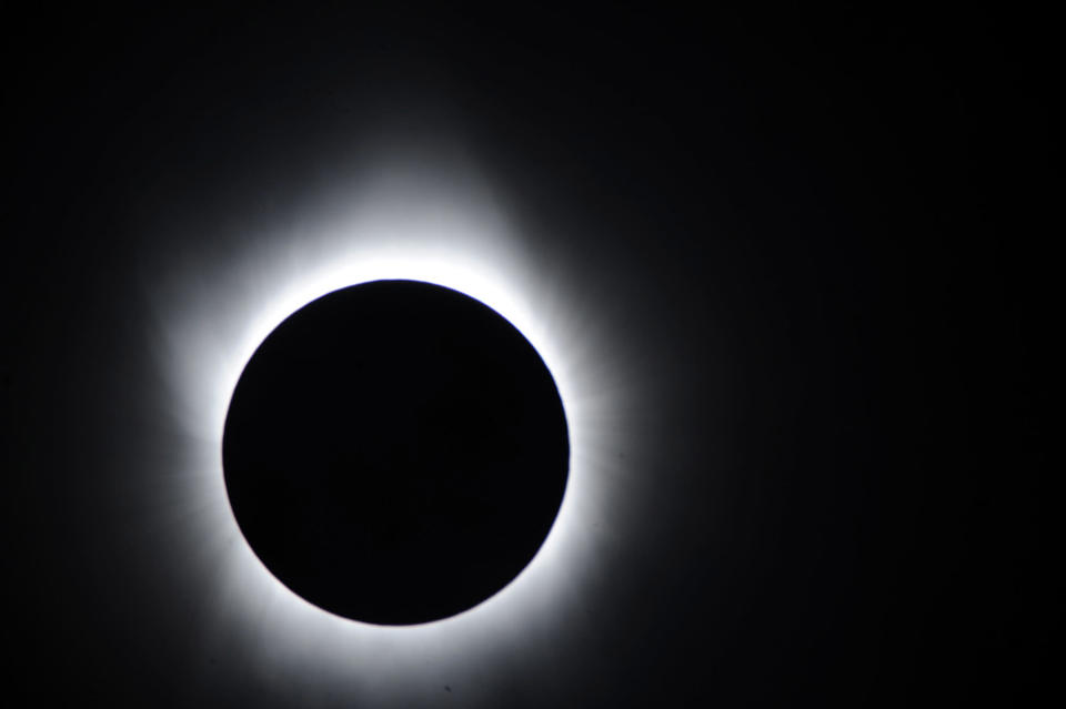 In this handout image provided by National Astronomical Observatory of Japan and transmitted with the help of NICT and JAXA, the solar eclipse is seen on July 22, 2009 in Iwojima Island, Tokyo, Japan. The longest total eclipse of the sun of this century triggered tourist fever in Asia as astronomy enthusiasts from home and abroad flocked to watch the event The eclipse was visible from within a narrow corridor that begins in India and crosses through Nepal, Bangladesh, Bhutan, Myanmar and China. (Photo by National Astronomical Observatory of Japan via Getty Images)