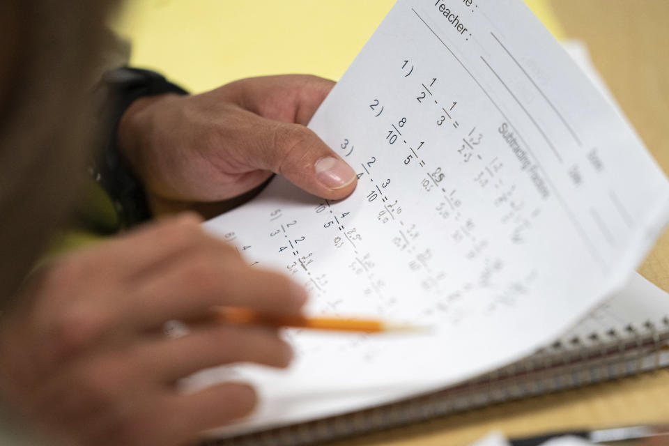 FILE - A student enlisted in the new Army prep course looks at their work at Fort Jackson in Columbia, S.C., Aug. 26, 2022. (AP Photo/Sean Rayford, File)