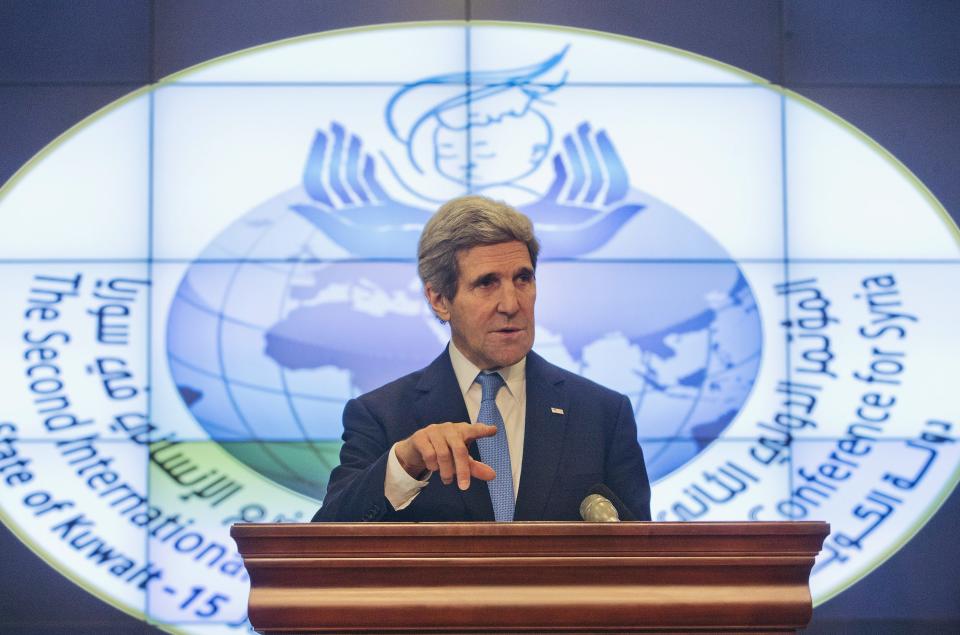 U.S. Secretary of State John Kerry speaks during his news conference at Syrian Donors Conference at the Bayan Palace in Kuwait City January 15, 2014. Donors including the United States and wealthy Gulf Arab countries pledged $1 billion on Wednesday for U.N. humanitarian efforts in Syria, devastated by almost three years of civil war. REUTERS/Pablo Martinez Monsivais/Pool (KUWAIT - Tags: POLITICS)