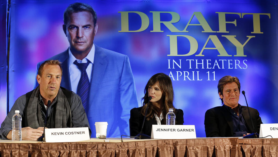 Actors,from left, Kevin Costner, Jennifer Garner and Denis Leary appear at a news conference for the movie "Draft Day" in New York on Friday, Jan. 31, 2014. The Seattle Seahawks play the Denver Broncos on Sunday at the stadium in the NFL Super Bowl XLVIII football game. (AP Photo/Paul Sancya)