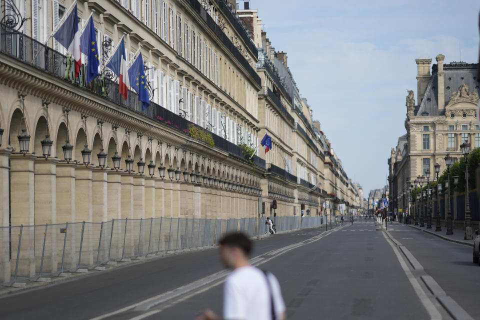 The Rivoli street is almost empty Thursday, July 18, 2024 in Paris. A special kind of iron curtain came down across central Paris on Thursday, with the beginning of an Olympic anti-terrorism perimeter along the banks of the River Seine sealing off a kilometers-long (miles-long) area to Parisians and tourists who hadn't applied in advance for a pass. (AP Photo/David Goldman)