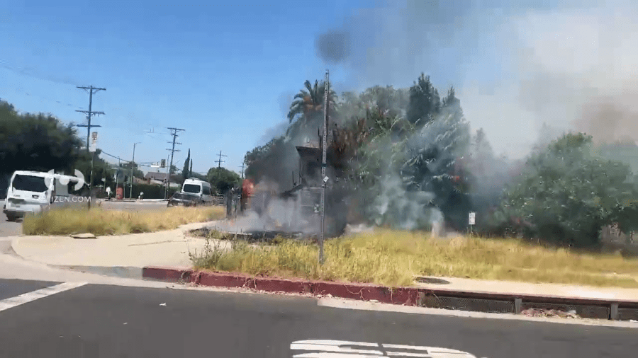 Video from the Citizen app shows firefighters responding to a fire burning at a vacant home in North Hollywood on July 19, 2024.