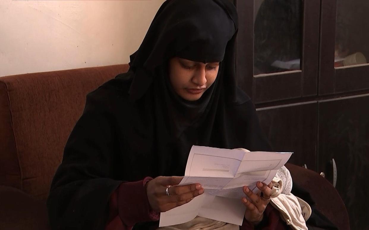 Shamima Begum reading a letter from the Home Office - PA