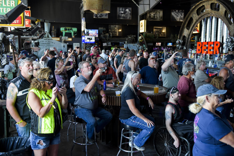 People watch a concert at the Full Throttle Saloon during the 80th Annual Sturgis Motorcycle Rally in Sturgis, South Dakota on August 9, 2020.  / Credit: Michael Ciaglo / Getty Images