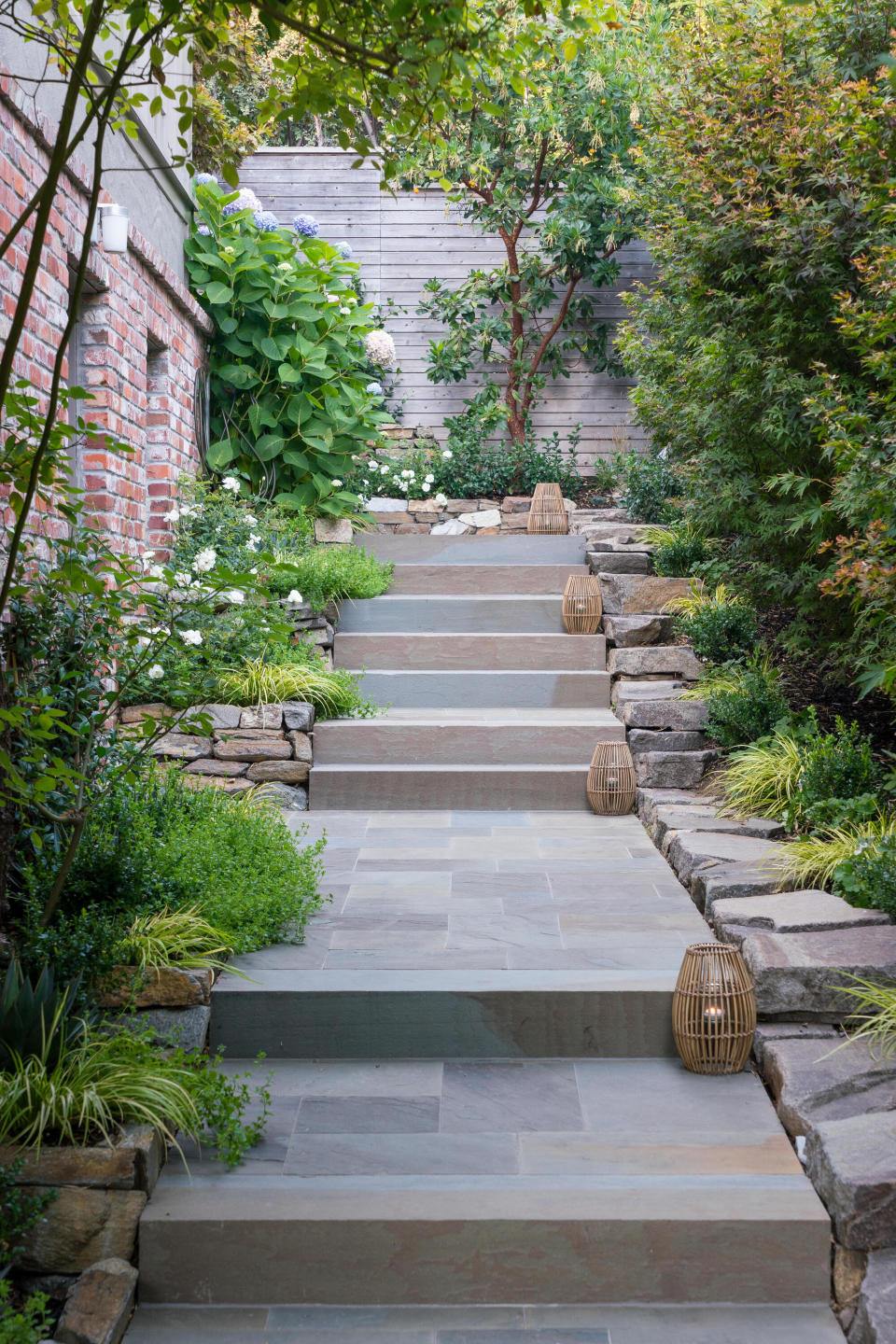 Outdoor path lit by lanterns