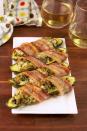 <p>Three things: creamy, salty and delicious. </p><p>Get the <a href="https://www.delish.com/uk/cooking/recipes/a35445177/bacon-wrapped-stuffed-zucchini-recipe/" rel="nofollow noopener" target="_blank" data-ylk="slk:Bacon Wrapped Stuffed Courgette;elm:context_link;itc:0;sec:content-canvas" class="link ">Bacon Wrapped Stuffed Courgette</a> recipe.</p>