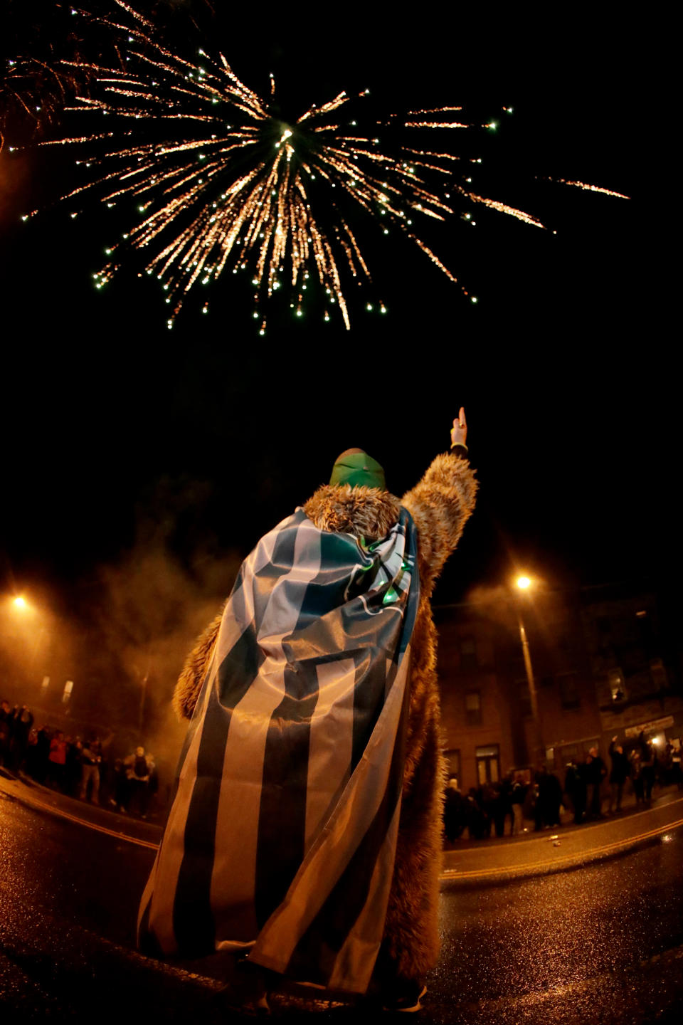 <p>A Philadelphia Eagles fan celebrates the team’s victory in the NFL Super Bowl 52 football game between the Philadelphia Eagles and the New England Patriots, Sunday, Feb. 4, 2018, in downtown Philadelphia. (AP Photo/Julio Cortez) </p>