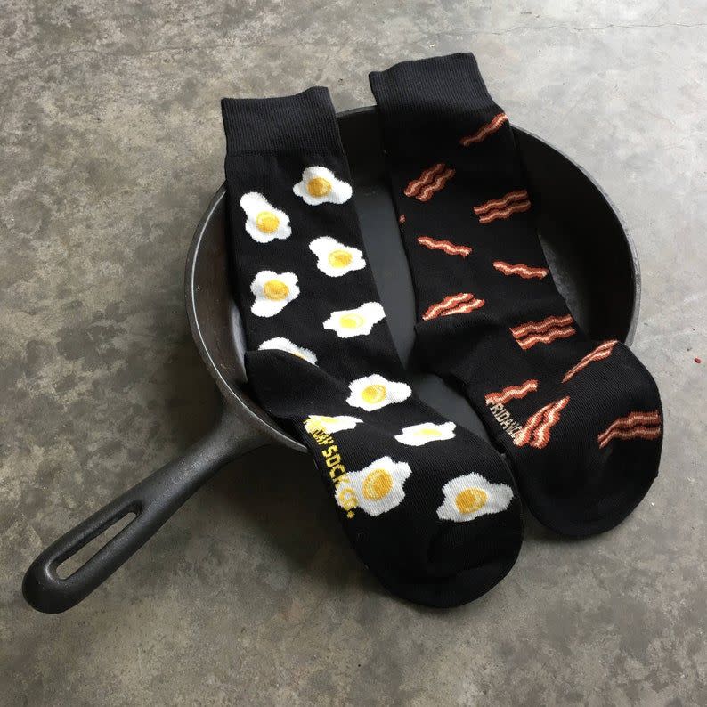 <p><strong>FridaySockCo</strong></p><p>etsy.com</p><p><strong>$13.95</strong></p><p>This is one pair of mismatched socks he <em>won't</em> feel frustrated by. Bacon and eggs, after all, are a perfect match in their own right.</p>