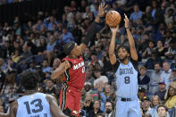 Memphis Grizzlies forward Ziaire Williams (8) shoots against Miami Heat guard Josh Richardson (0) in the first half of an NBA basketball game, Wednesday, Nov. 8, 2023, in Memphis, Tenn. (AP Photo/Brandon Dill)