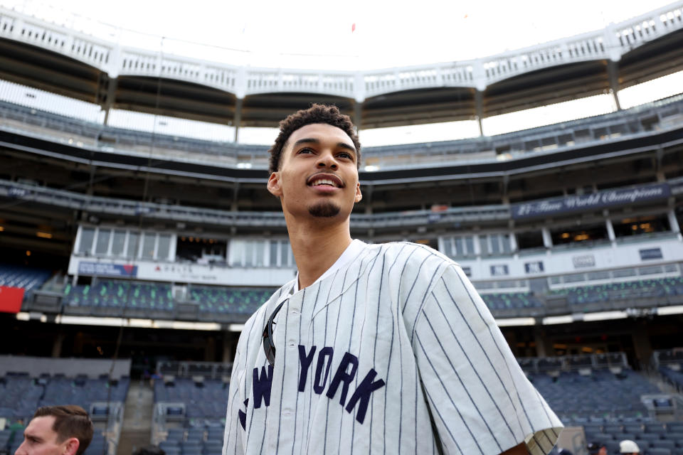 Victor Wembanyama takes in the scene at Yankee Stadium on June 20, 2023 where he threw out the first pitch before the Yankees' game against the Seattle Mariners. (Photo by New York Yankees/Getty Images)