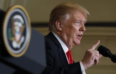 U.S. President Donald Trump addresses a joint news conference with Australian Prime Minister Malcolm Turnbull in the East Room of the White House in Washington, U.S., February 23, 2018. REUTERS/Kevin Lamarque