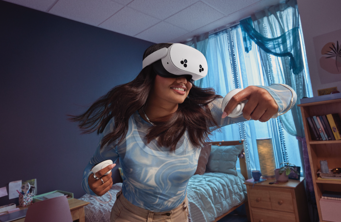 A lady using a VR headset.