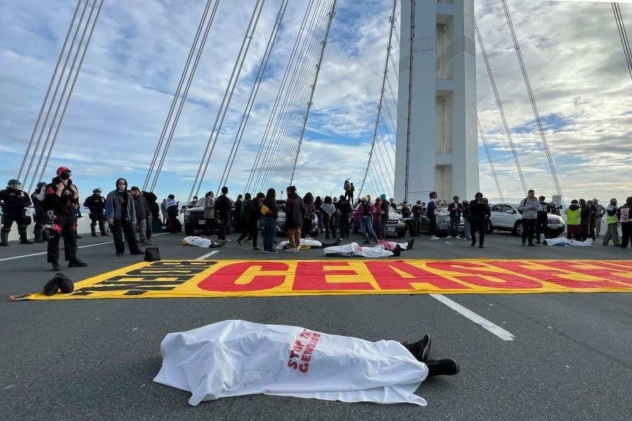 Demonstrators shut down the San Francisco Oakland Bay Bridge in conjunction with the APEC Summit taking place Thursday, Nov. 16, 2023, in San Francisco. (AP Photo/Noah Berger)