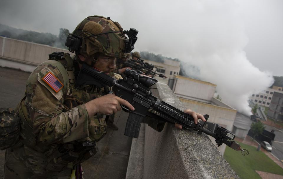 U.S. soldiers from 2nd Infantry Division, participate in a UFS/TIGER Combined Urban Operations plan as part of Ulchi Freedom Shield (UFS) exercises at Wollong Urban Area Operatiions training center, Wednesday, Aug. 23, 2023 on Paju in Gyeonggi-do, South Korea. (Jeon Heion-Kyun/EPA via AP, Pool)