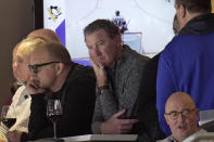 Former Pittsburgh Penguins' Mario Lemieux, center, watches an NHL hockey game between the Pittsburgh Penguins and the Ottawa Senators in Pittsburgh, Monday, March 20, 2023. (AP Photo/Gene J. Puskar)