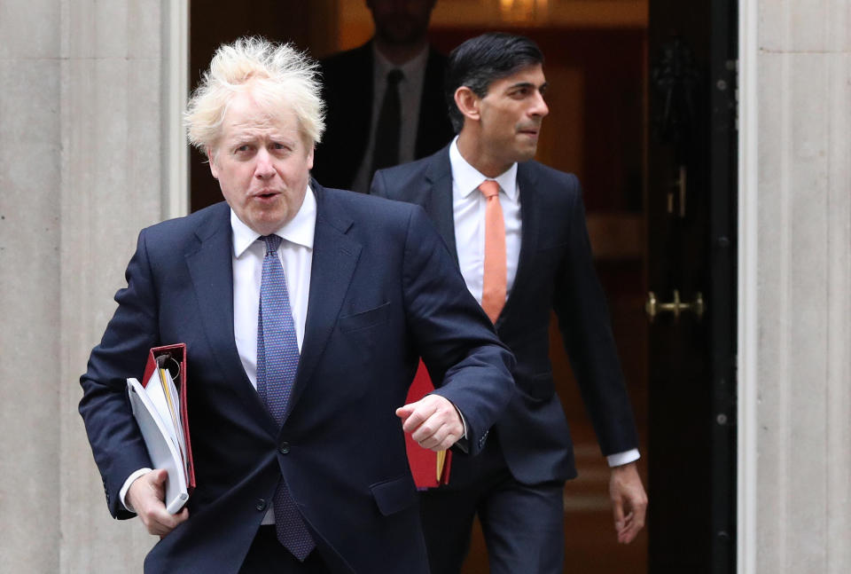 Prime Minister Boris Johnson (left) and Chancellor of the Exchequer Rishi Sunak leave 10 Downing Street London, ahead of a Cabinet meeting at the Foreign and Commonwealth Office.