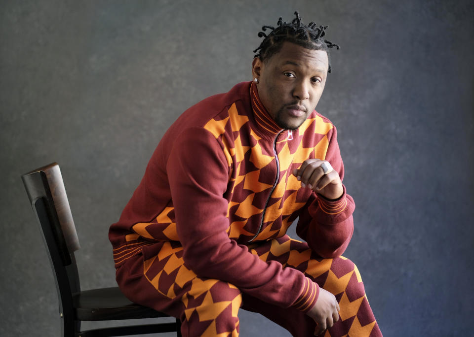 FILE - Record producer and recording artist Hit-Boy poses for a portrait, Tuesday, March 8, 2022, in Los Angeles. When Hit-Boy walks the Grammy red carpet, he expects to proudly strut into the Feb. 4, 2024 awards ceremony with his father beside him for the first time. (AP Photo/Chris Pizzello, File)