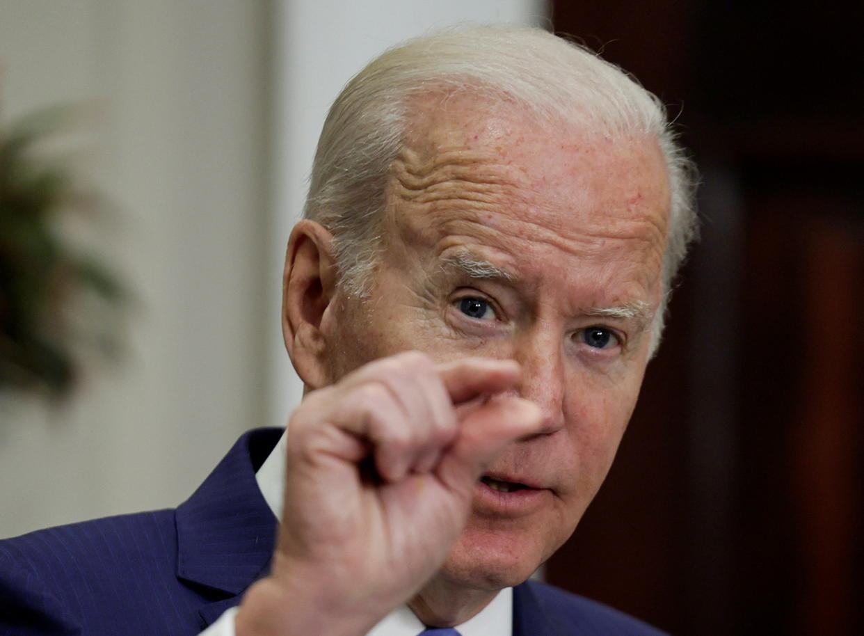 U.S. President Joe Biden announces additional military and humanitarian aid for Ukraine as well as fresh sanctions against Russia, during a speech in the Roosevelt Room at the White House in Washington, U.S., April 28, 2022. REUTERS/Evelyn Hockstein
