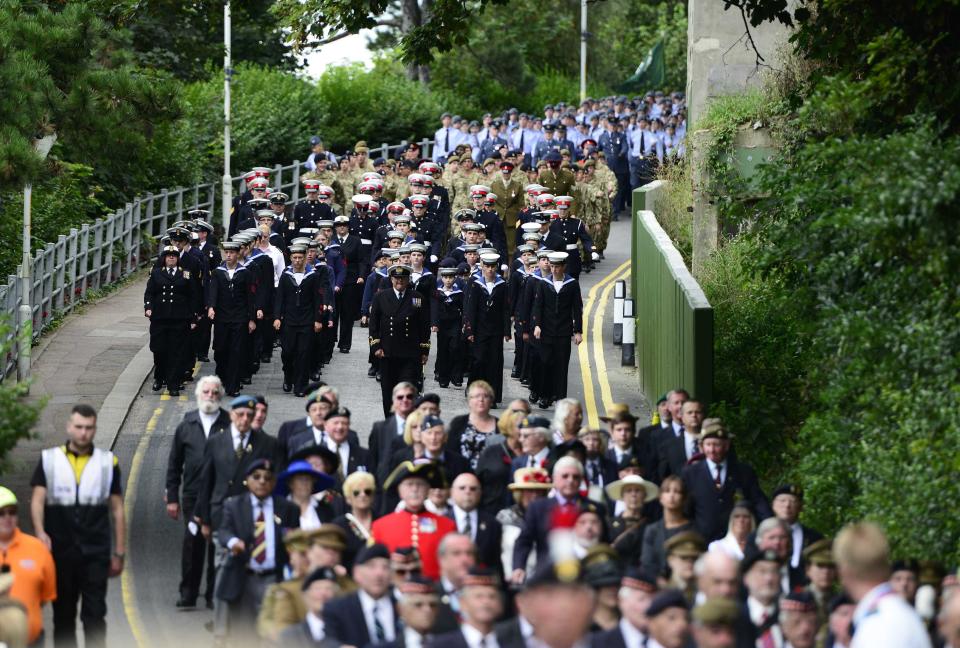 Veterans and soldiers march in the "Short Step" parade, during a ceremony to mark the 100th anniversary of the outbreak of World War One (WW1), in Folkestone, southern England August 4, 2014. (REUTERS/Dylan Martinez)