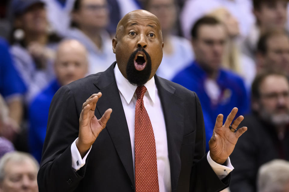 Indiana head coach Mike Woodson calls instructions to his team during the first half of an NCAA college basketball game against Kansas in Lawrence, Kan., Saturday, Dec. 17, 2022. (AP Photo/Reed Hoffmann)