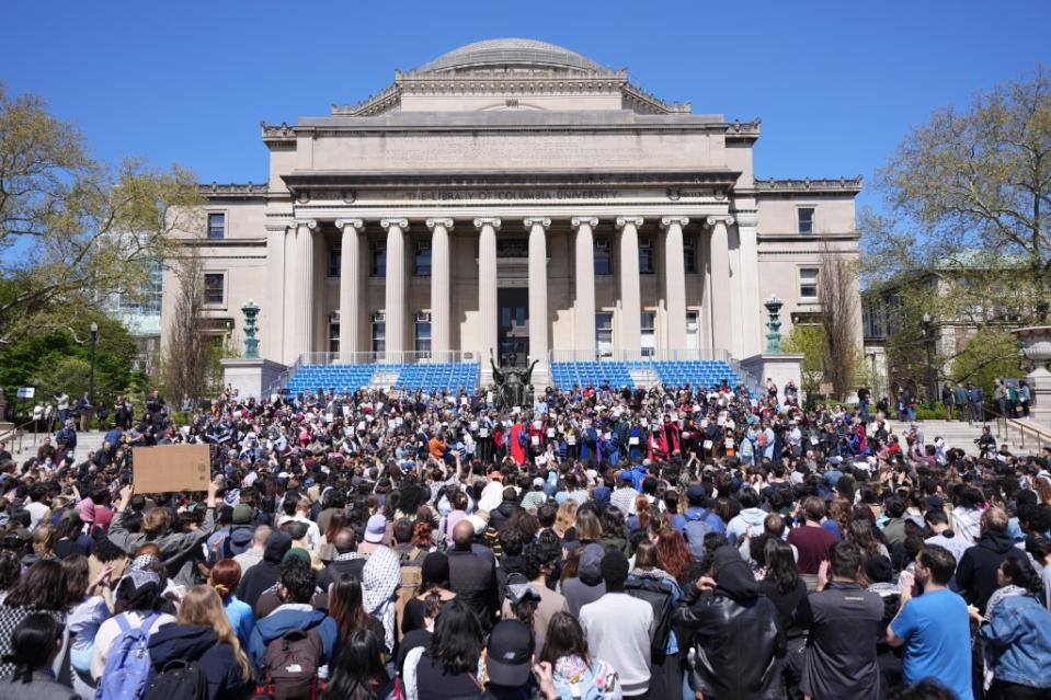 People gather at a faculty rally to protect academic freedom at Columbia on Monday. James Keivom