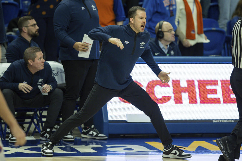 Utah State head coach Danny Sprinkle reacts to a call in overtime against Boise State an NCAA college basketball game, Saturday, Jan. 27, 2024, in Boise, Idaho. Utah State won 90-84. (AP Photo/Steve Conner)